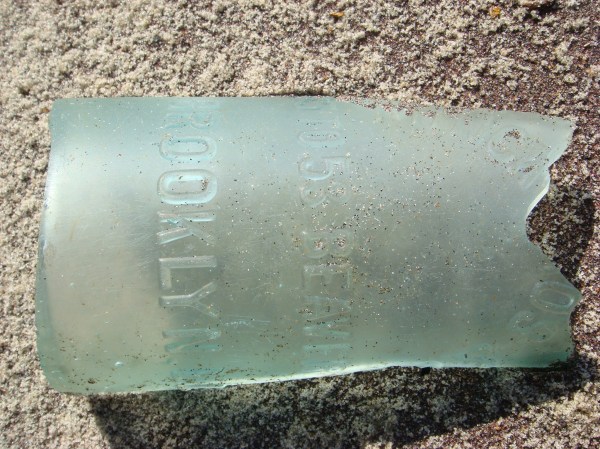 An intact Brooklyn-produced bottle is much sought-after by scavengers. Such items help illuminate the circulation of goods at certain points in history. Photograph by Max Liboiron.