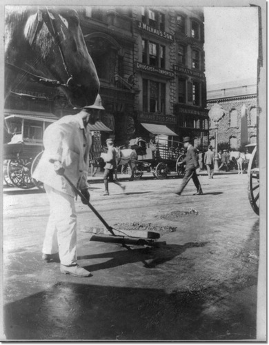 new-york-city-sanitation-dept-employee-sweeping-street-ca-1910