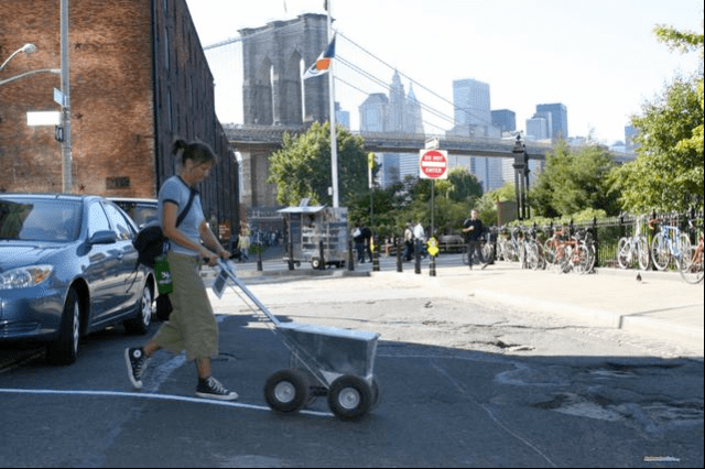 Eve Mosher drawing the "High Water Line," 2007.
