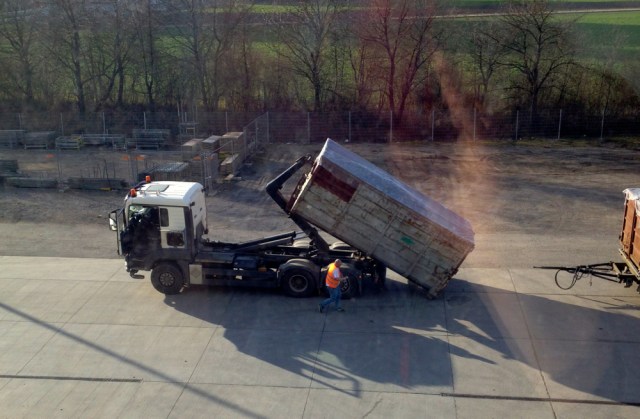 Recently arrived truck preparing to unload a container of shredded waste (sometimes also called Refuse Derived Fuel, or RDF). Author’s photo.