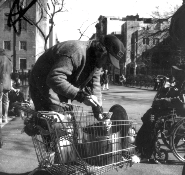 Food Not Bombs diner and-or volunteer, Tompkins Square Park, New York City, 1996. Photograph courtesy Vikki Law.
