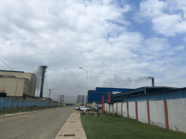 chimneys of two steel smelting companies
